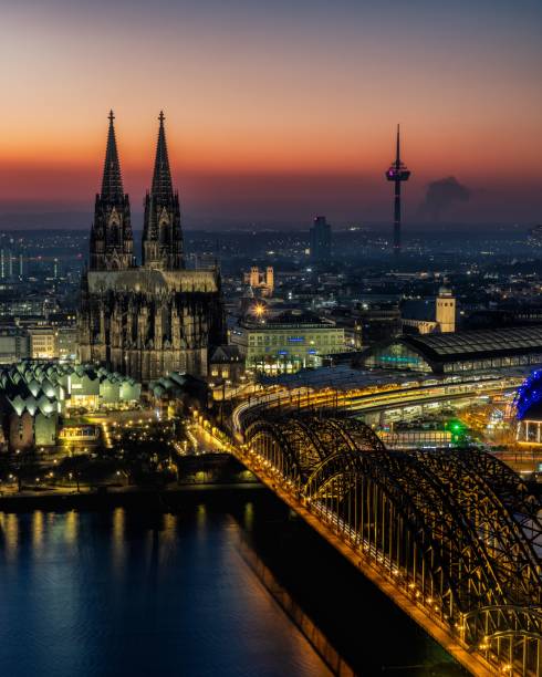 istock Cologne Cathedral and Hohenzollern Bridge at Sunset 2196156668