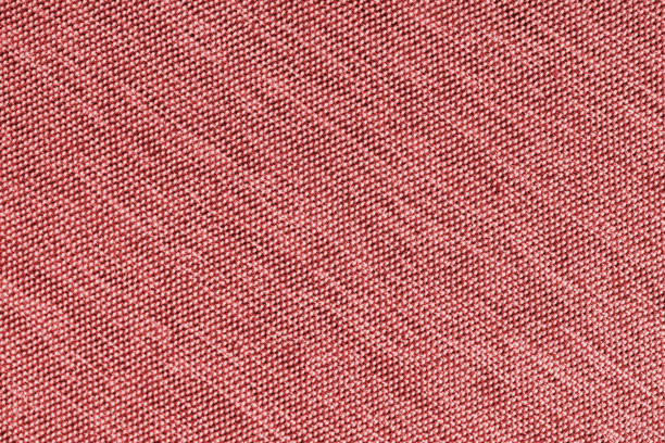 istock Closeup, macro of red fabric texture background. Satin diagonal weaving cloth structure, canvas 2196156925