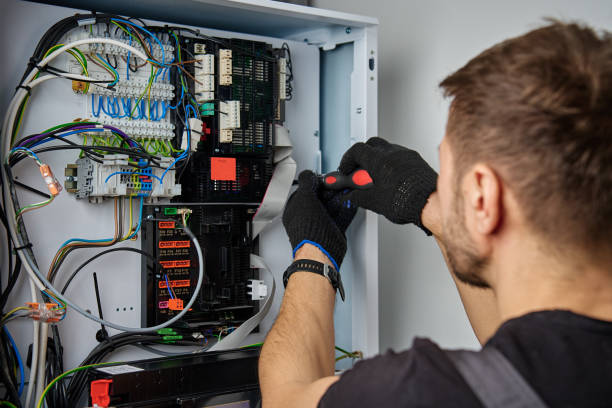 istock Electrician Repairing Heat Pump Control Panel 2196158127