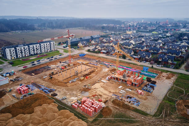 istock Construction site with cranes building new houses 2196158487