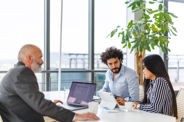 istock Diverse Business Meeting in Modern Office Setting 2196159152