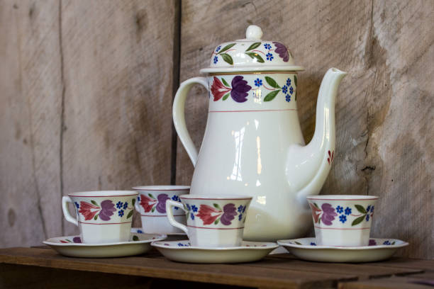 istock A glazed coffee pot and four cups 2196162510
