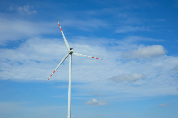 Horizontal axis wind turbine in the country on a cloudy day, electrical power green production