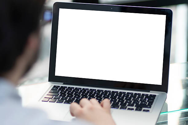 Laptop with blank screen. A mockup of a with hands typing on the keyboard
