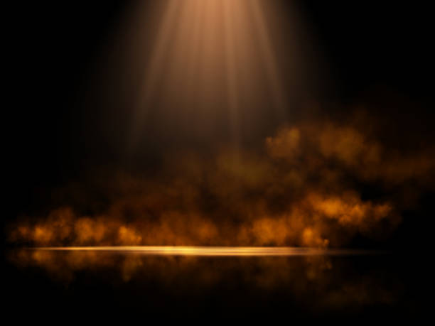 istock A dramatic golden spotlight illuminates a dark stage, surrounded by shimmering particles and a warm, ethereal glow, creating a mystical and elegant atmosphere with subtle reflections. 2196164001