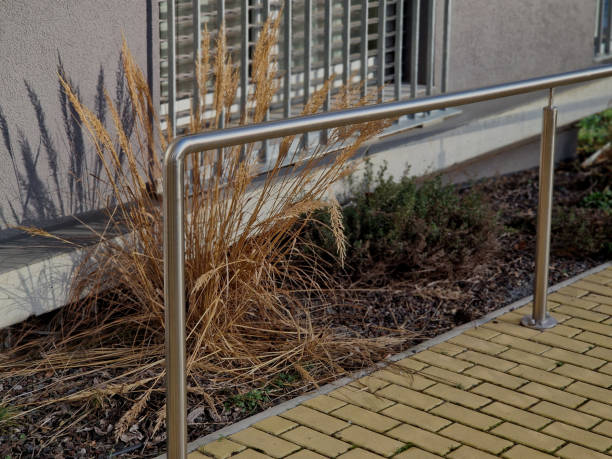 istock We installed prepared anchors from aluminum mobile scaffolding using stainless steel rails. railing is made of hardened, glued safety film and protects children from falling out when window open 2196165386