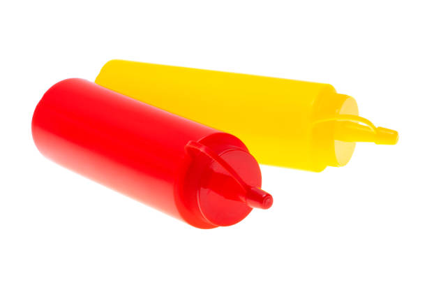 istock bottle with ketchup and mustard isolated 2196165908