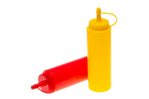 istock bottle with ketchup and mustard isolated 2196165970