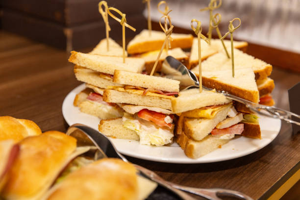 Sandwiches on a buffet table at a celebratory event