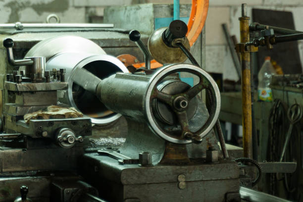 istock Machinery in action at a vibrant workshop creating precise metal parts 2196175424