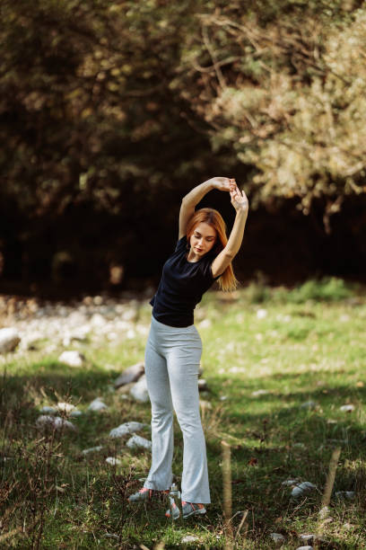 istock Redhead woman running and exercising in nature 2196175498