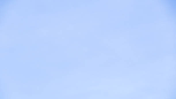 istock Blue sky background with tiny clouds, Nature cloud blue sky background, Blue Sky with Fluffy White Clouds on a Sunny Summer Day 2196175822