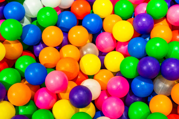 A vibrant display of multicolored balls in a playful dry pool