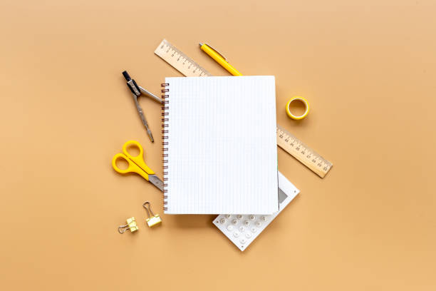 istock Education concept. Blank sheet of notebook with supplies, top view 2196186801