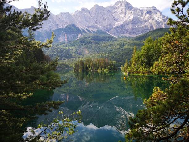 istock Tranquil Lake with Majestic Mountains 2196188735
