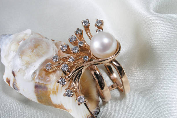 istock Gold ring with pearls and diamonds 2196188770