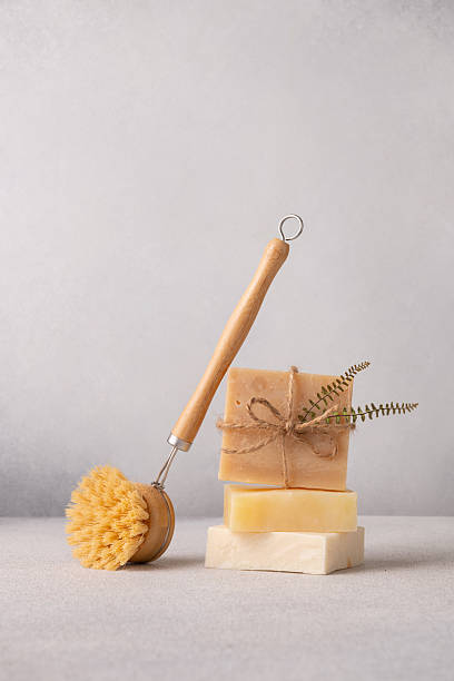 istock Stack of handmade soap and a dishwashing brush with natural bristles and a bamboo handle 2196191328