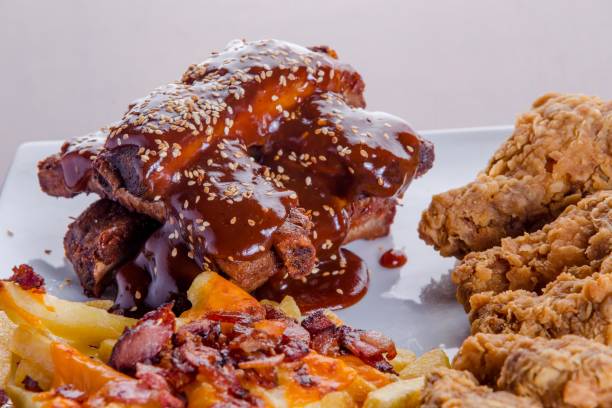 istock ribs in barbecue sauce with chicken 2196196375