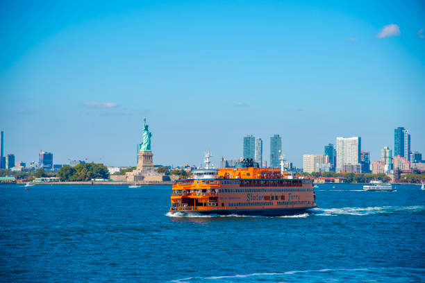New York City, USA - July 3, 2024: View of the Staten Island Ferry ready to set sail for the Lower Manhattan Ferry Terminal in New York.