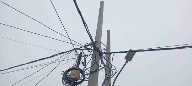 istock Street Light and Electricity poles 2196197653