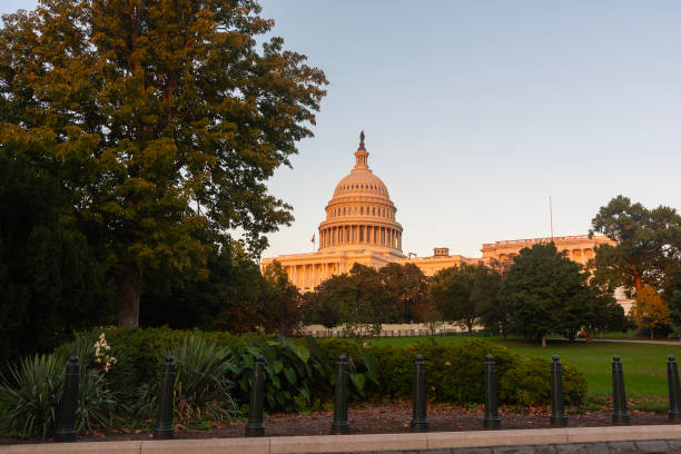 istock United States Capitol Building under a clear sky at sunset 2196198947