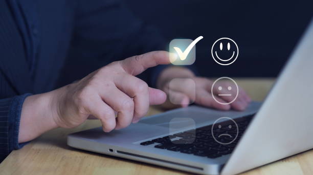 istock Customer service and Satisfaction concept ,Business people are touching the virtual screen on the happy Smiley face icon to give satisfaction in service.customer 2196199232