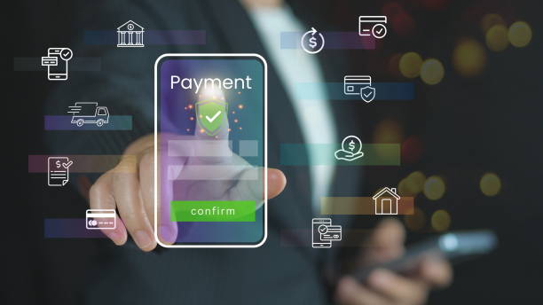 istock Businessman using smartphone with icons on virtual screen, online shopping and payment via mobile banking apps financial technology 2196199308