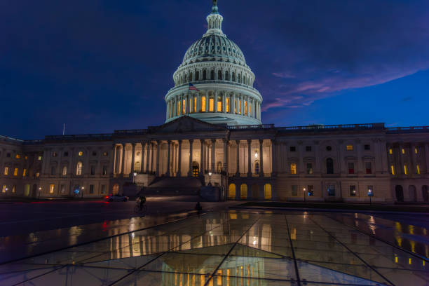 istock United States Capitol Building under a blue sky at sunset 2196199725