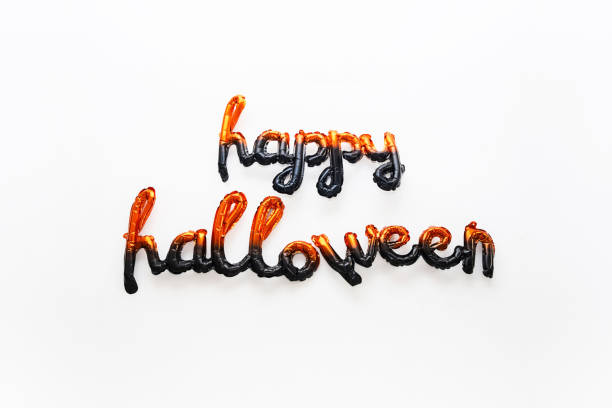 Balloon letters Happy Halloween against white background.