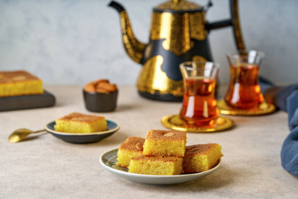 istock Middle eastern traditional semolina cake basbousa , namoora, hareesa served with tea 2196200005