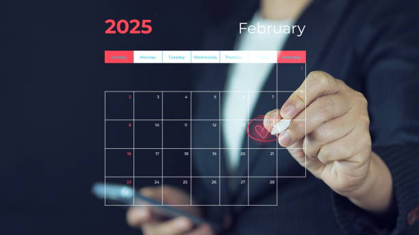 istock Calendar agenda appointment meeting schedule concept. Businessman using pen to write circle red mark on virtual calendar. .Valentine's Day 2196200533