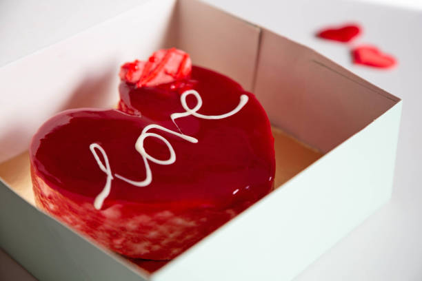 istock A glazed red heart-shaped cake with the inscription 