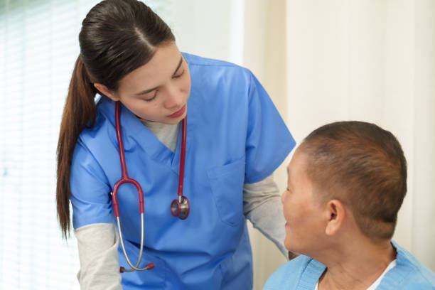 Hospital nurse, patient support and hands held together with empathy, kindness and compassion. Nursing professional, healthcare wellness clinic and medical counseling a woman sorry for cancer results