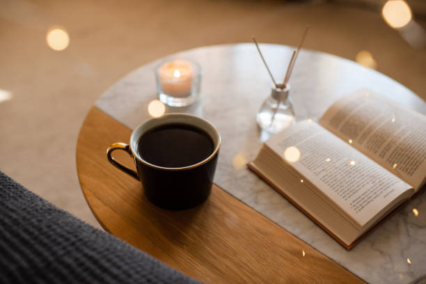 istock Reading book with morning fresh coffee 2196210424