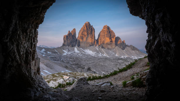 istock Tre Cime Di Lavaredo  in the Dolomites seen from rocky cave 2196216806
