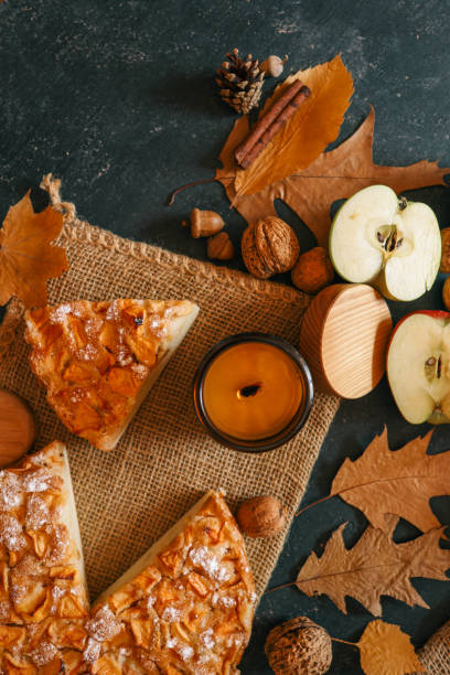 istock Candle and homemade apple pie, autumn mood 2196217212
