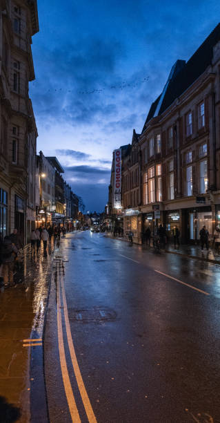 istock Evening Street View with Dramatic Blue Sky and Lights 2196217267
