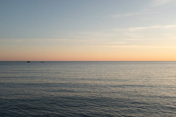 istock Adriatic Sea Sunset with Serene Horizon and Gentle Waves Under a Softly Colored Sky for publication, poster, calendar, post, screensaver, wallpaper, postcard, cover, website. High quality photography 2196218241