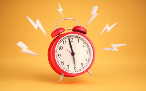 istock Red Alarm Clock on Yellow Infinite Background with Wake Up Icons Around It 2196219184