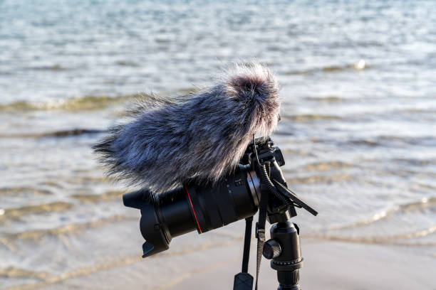 istock A camera is on a tripod close-up on a beach 2196222041