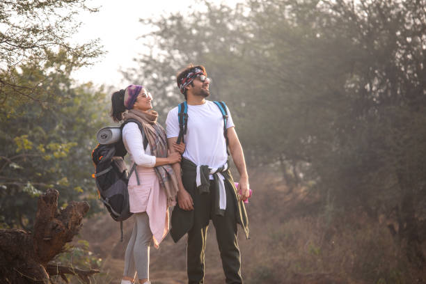 istock Young couple hiking in forest 2196222125