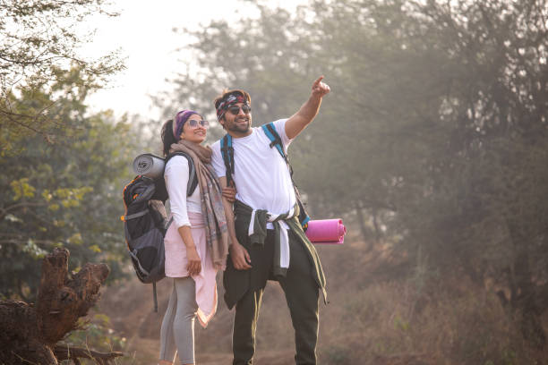 istock Young couple hiking in forest 2196222203