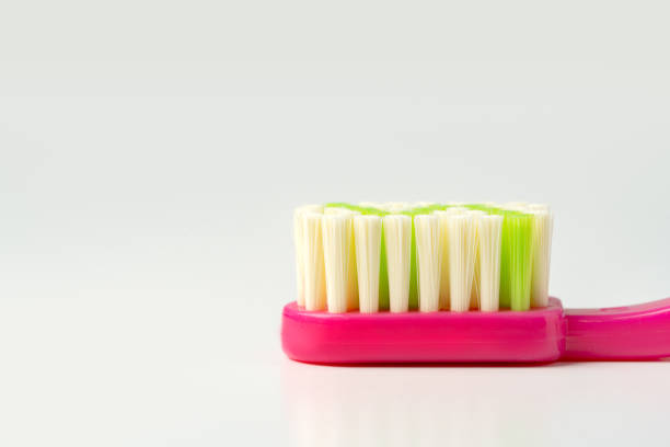 Macro Photo of Pink Toothbrush with Copy Space