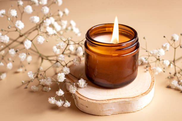 istock Scented candle and white gypsophila flowers 2196225349