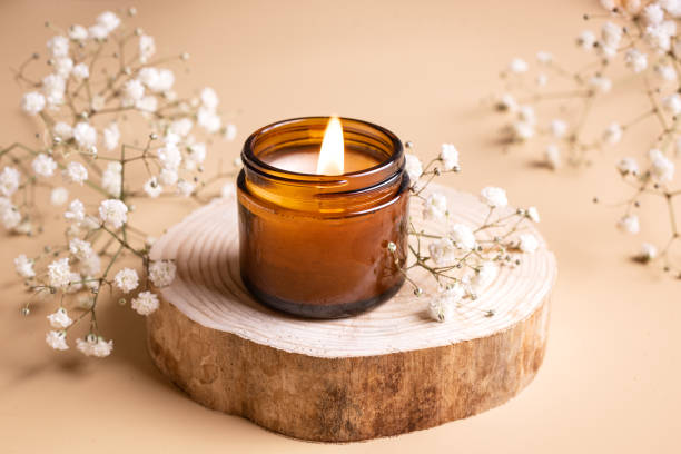 istock Aroma candle and white gypsophila flowers 2196225376