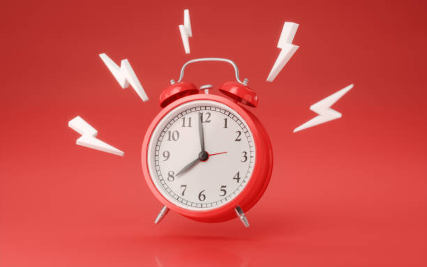 istock Red Alarm Clock on Red Infinite Background with Wake Up Icons Around It 2196226232