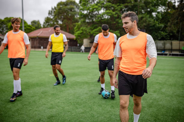 istock Men training together on a soccer field in Sydney, Australia with focus on teamwork and enjoyment of the sport 2196228276