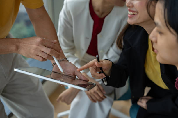istock Cheerful group of colleagues talking and chatting during a coffee break 2196231426