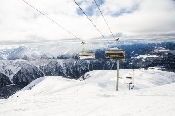 istock Ski resort slope and ski lft. Alpine ski / snowboard vacation. 2196231556