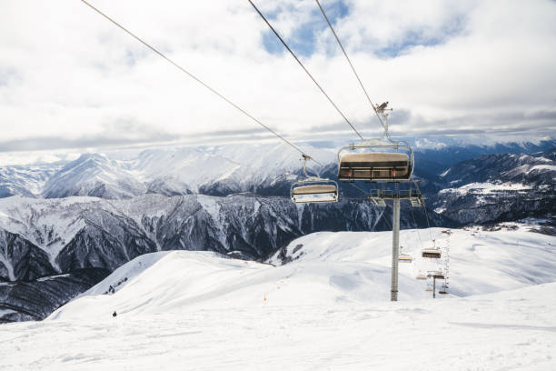 istock Ski resort slope and ski lft. Alpine ski / snowboard vacation. 2196231565